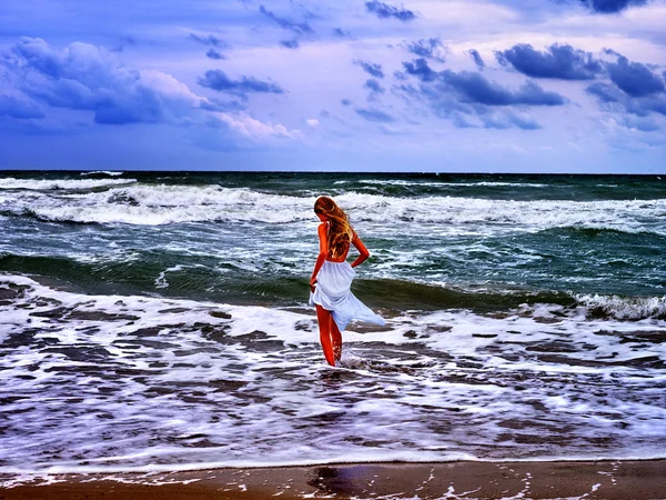 Summer girl sea walk on water beach.