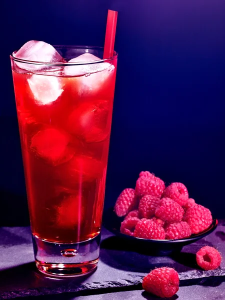 Red  raspberry cocktail  on dark background