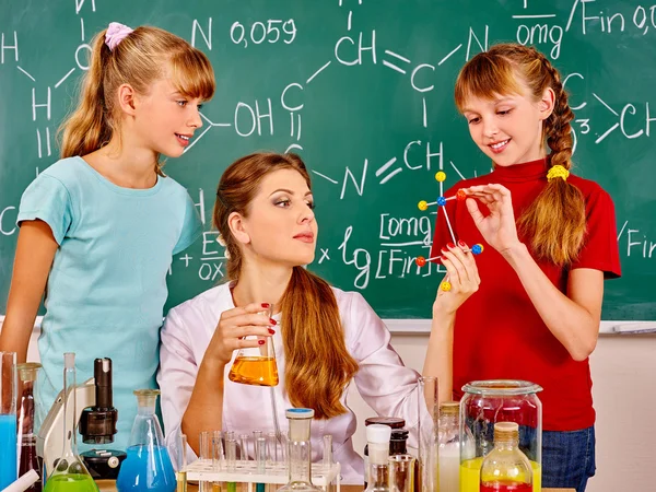 Children in chemistry class.