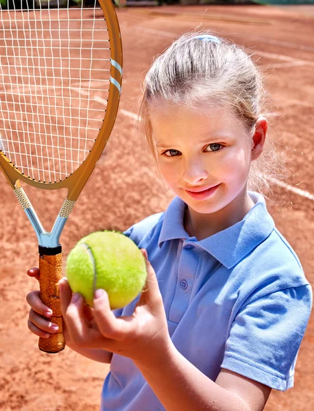 Sister girl athlete  with racket and ball
