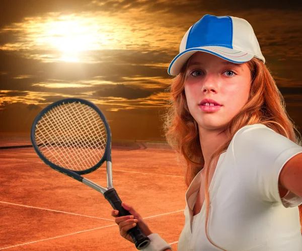 Girl  holding tennis  racket on sun sky with clouds.