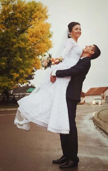 Groom lift on his hands bride