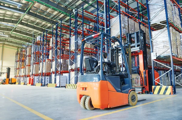 Forklift loader stacker truck at warehouse