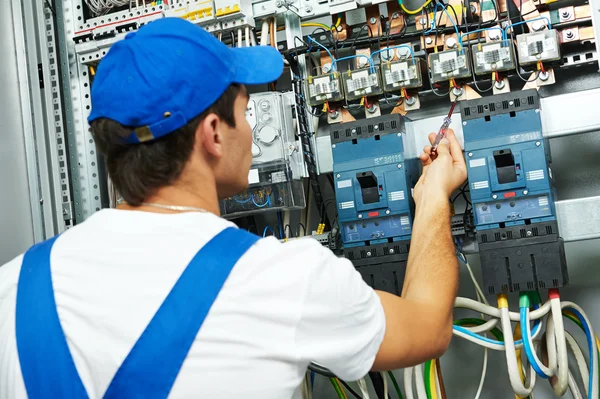 Electrician checking voltage