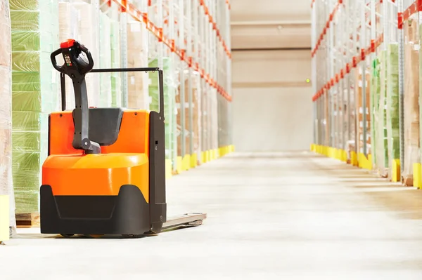 Pallet truck at warehouse