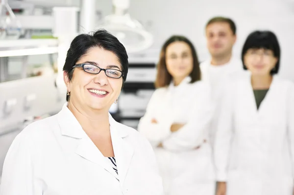 Pharmaceutical staff workers in uniform