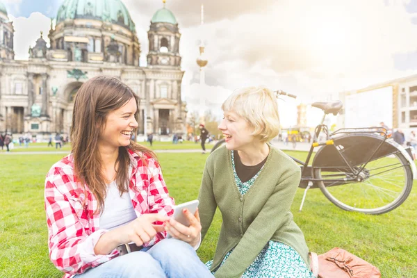 Two young women relaxing in Berlin