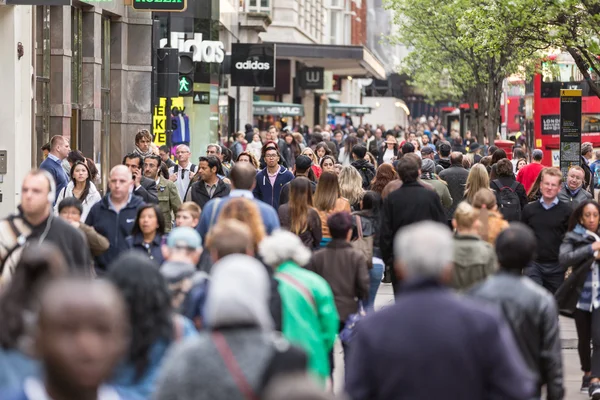Crowded sidewalk on Oxford Street in London