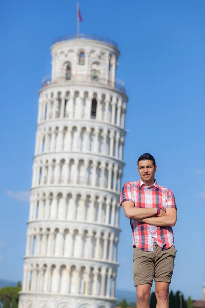 Boy Posing with Leaning Tower