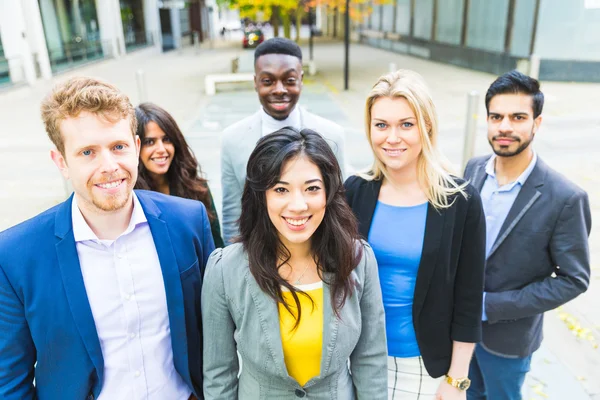 Business group looking at camera