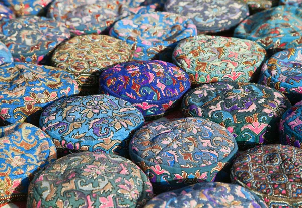 The traditional Uzbek cap, named tubeteika, on a market