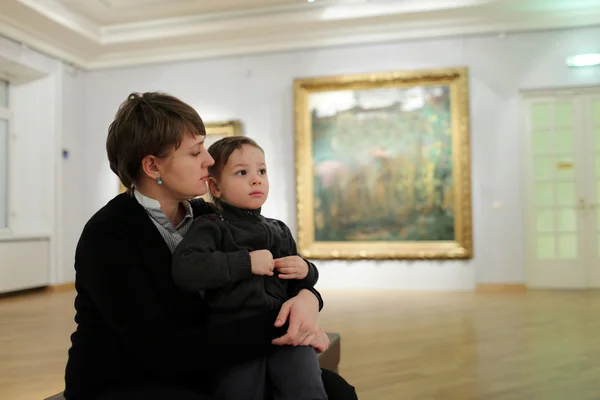 Mother and son in the gallery