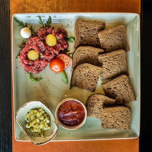 Beef tartar on plate