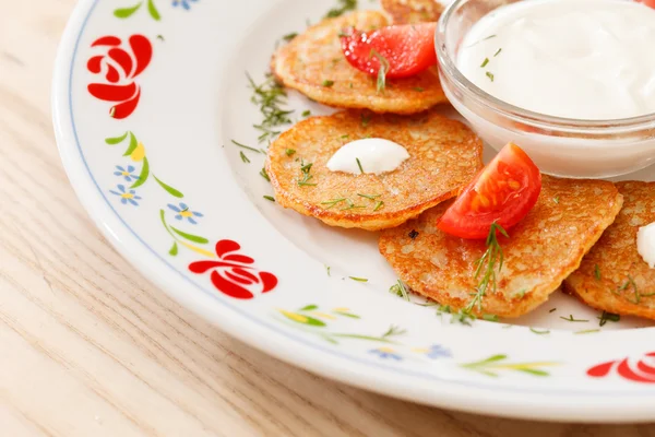 Potato pancakes with vegetables