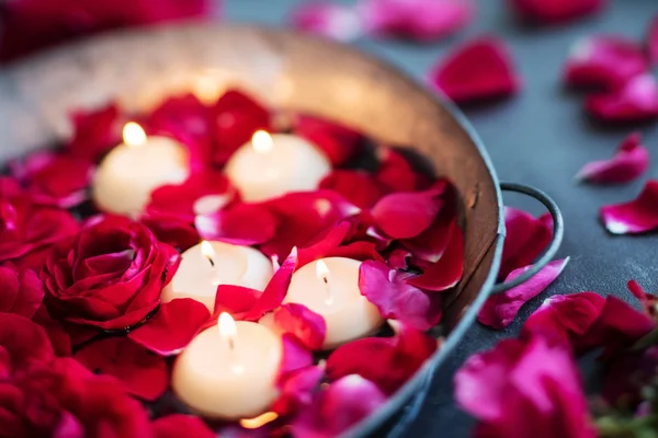 Rose petals and candles
