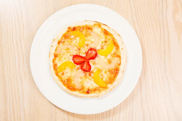 Sweet pizza with fruits