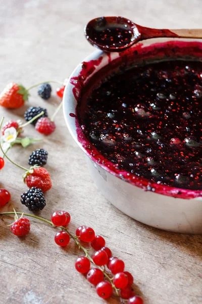 Preparing berries jam
