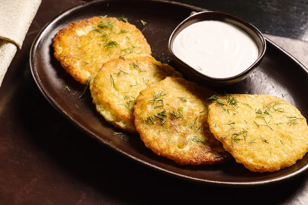 Potato pancakes with cream