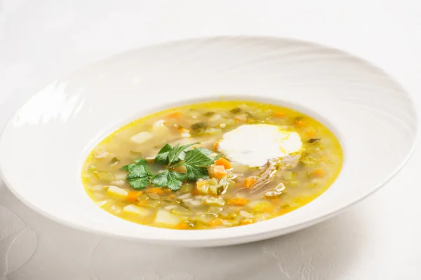 Barley soup in  plate