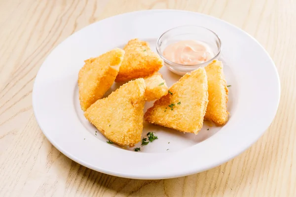 Fried cheese on plate