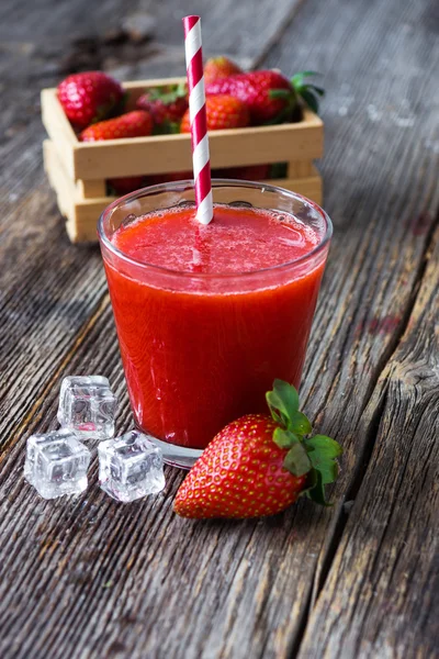 Fresh strawberries and strawberry juice