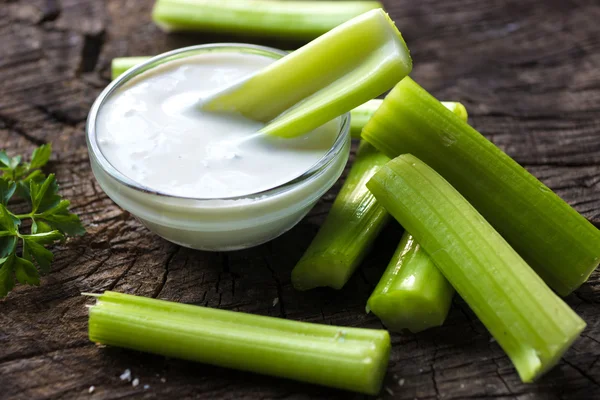 Celery sticks with white sauce