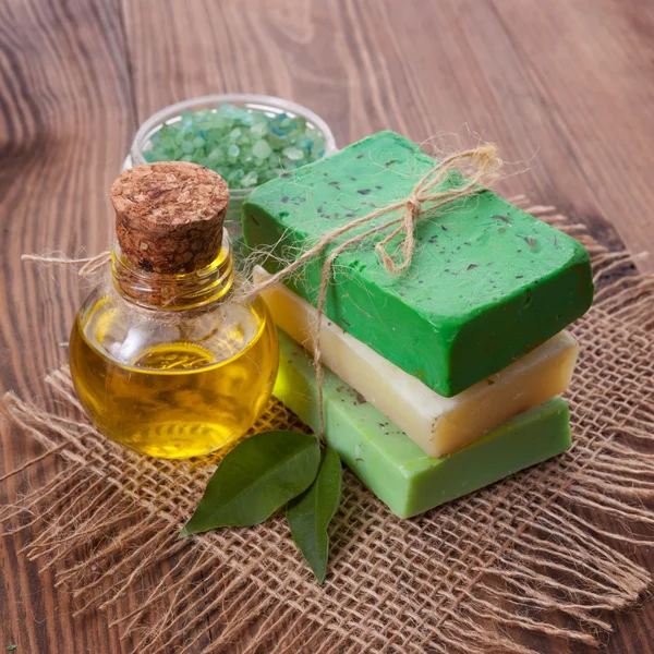 Piece of natural soap with oil and herbs