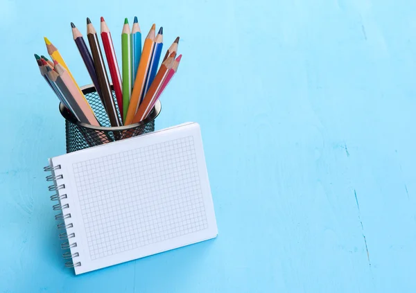 Blank Note Pad and colorful Pencils