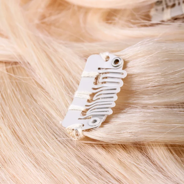 Blond hair extension