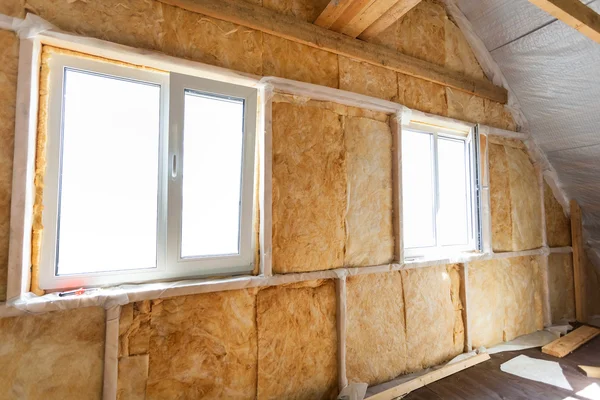 Inside wall heat isolation with mineral wool in wooden house