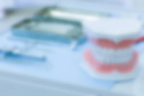 Set of dentistry medical tools, blurred
