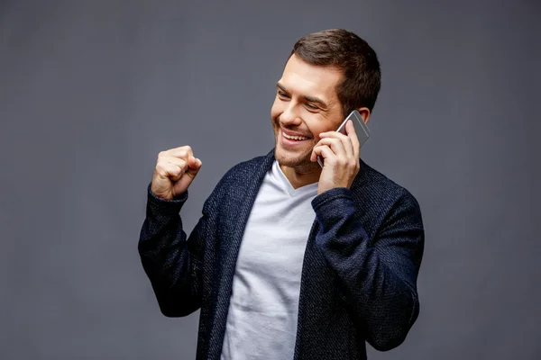 Cheerful young man in smart casual wear