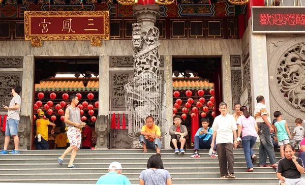 People Enter a Large Temple in Taiwan