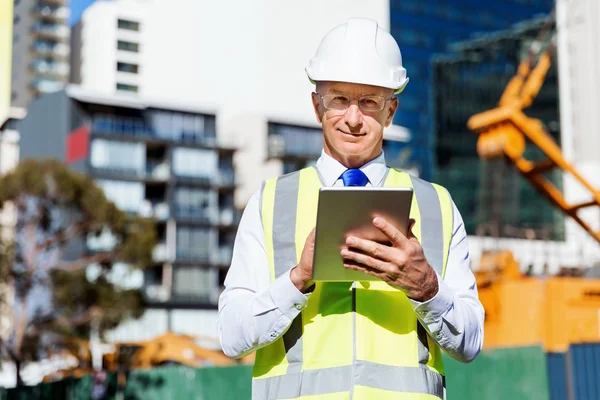 Engineer builder at construction site