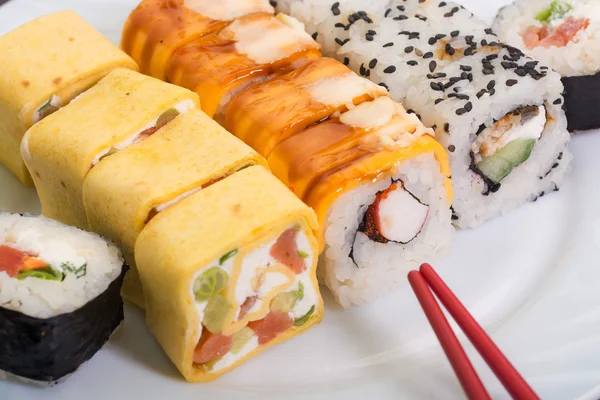 Traditional Japanese food Sushi. Sushi collection on white plate