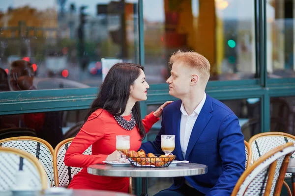 Romantic couple in Paris in cafe
