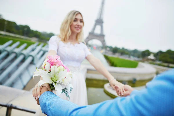 Just married couple near the Eiffel tower in Paris