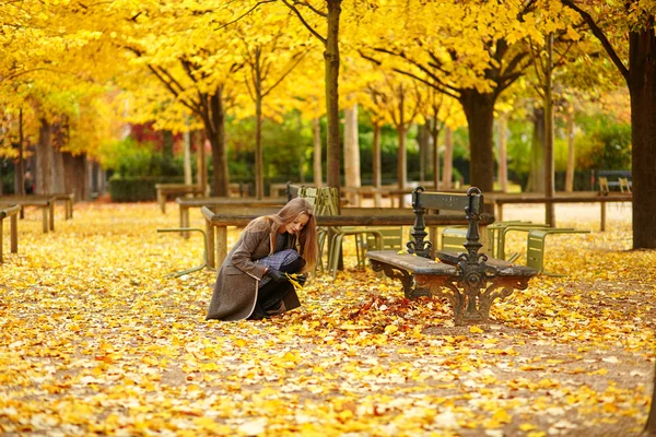 Young girl in Paris on a fall day