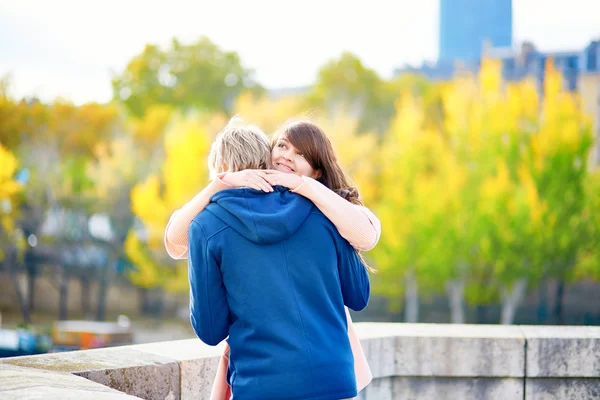 Young couple in Paris on a bright fall day