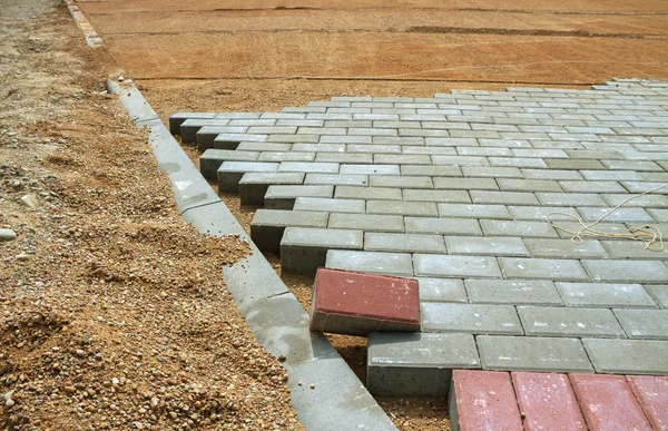 Sidewalk pavement construction.