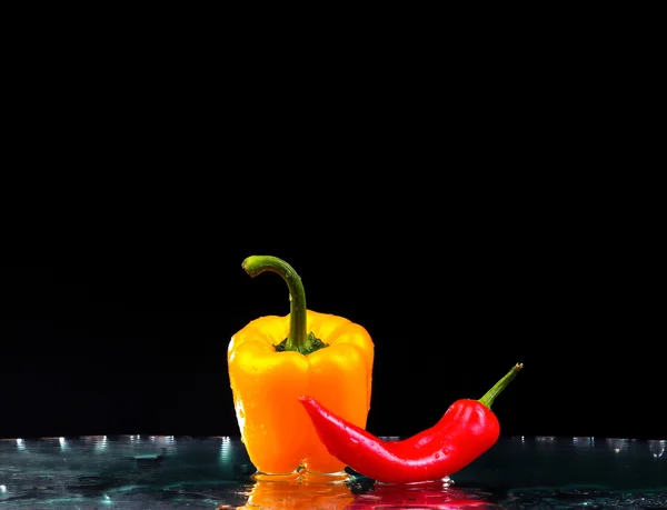 Fresh water splash on red sweet pepper