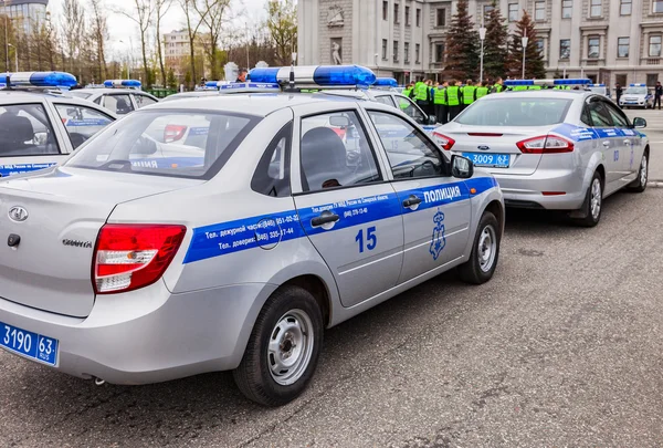 Russian police patrol vehicles parked on the Kuibyshev square