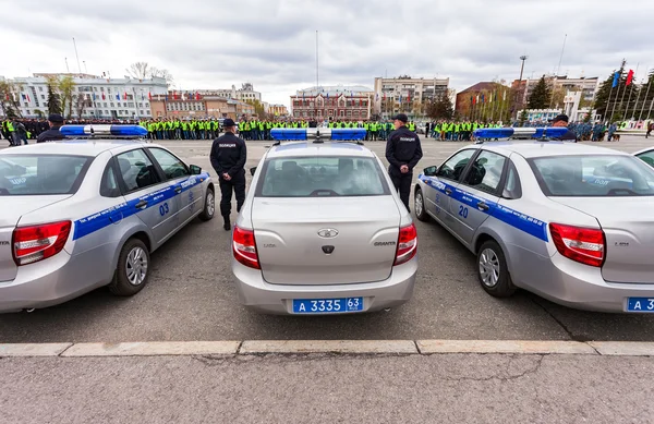 Russian police patrol vehicles parked on the Kuibyshev square