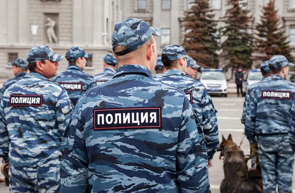 Russian police unit in uniform with police dogs on the Kuibyshev