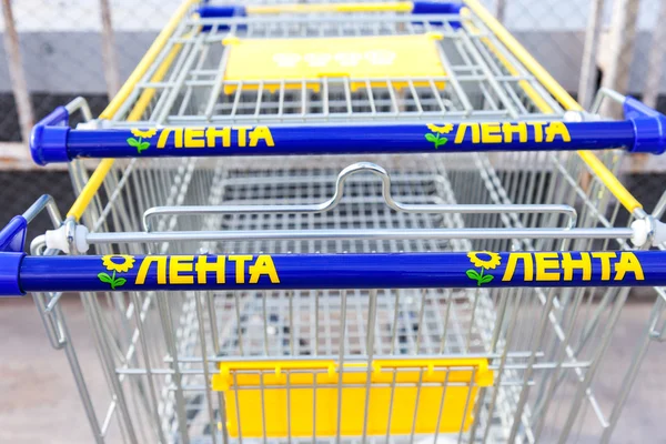Shopping cart of Lenta store. Lenta is one of the largest retail