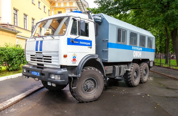 Russian police heavy truck parked on the city street in summer day