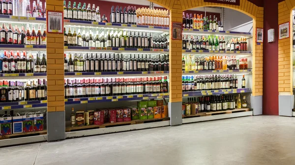 Showcase alcoholic beverages at the hypermarket METRO
