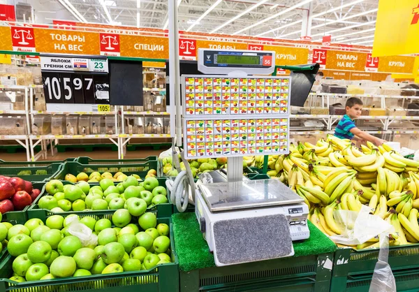 Electronic scales in produce department of the Auchan store