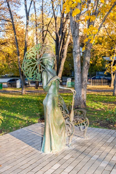Lady with tennis racket. Monument in Samara, Russia