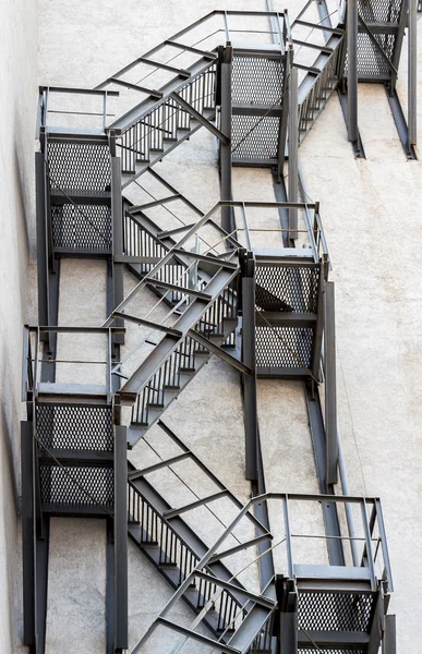 Metal fire stairs on the facade of building